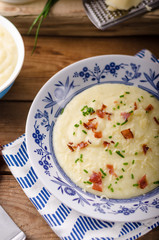 Mashed potatoes, fresh herb and crispy bacon in