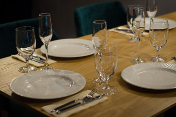 Empty glasses in restaurant, table setting