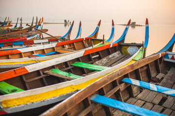 Fototapeta na wymiar Colorful boats at sunrise