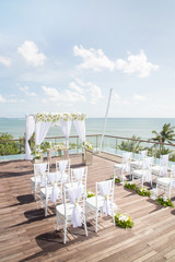 Beautiful boho wedding set up, flower decoration, tropical style