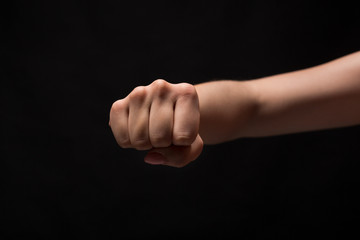 Hand gesture, woman clenched fist, ready to punch