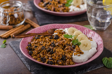 Granola baked in oven with nuts