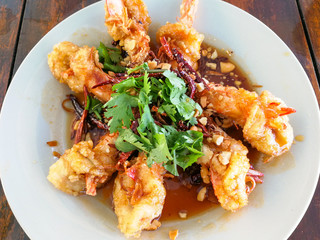 Deep fried shrimps with tamarind sauce  on the white plate
