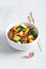 Traditional korean salad of with cucumbers, beef and vegetables