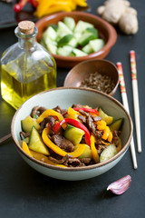 Achik syay is traditional salad of Uighur cuisine with beef and vegetables on the balck chalkboard