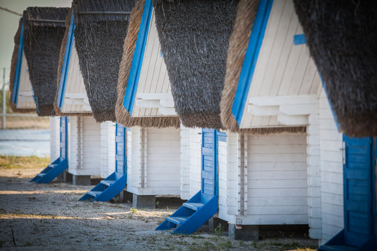 White and blue painted huts