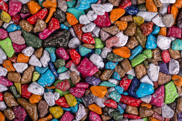 Fototapeta na wymiar Colored candy made in the form of pebbles sold in the store in Egypt, close up