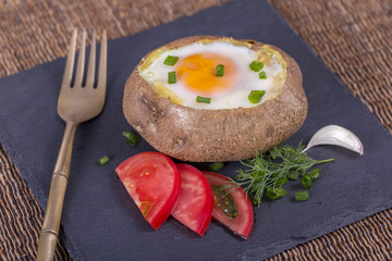 Baked potatoes stuffed with cheese and egg