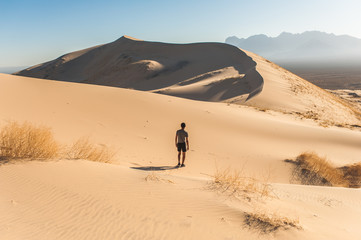 Fototapeta na wymiar A man lost in the desert
