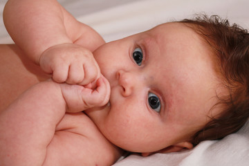 Portrait of the newborn child. Kid.