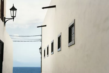 Meubelstickers Beautiful architectural glimpse with the ocean in the background in Garachico, Tenerife, Canary Islands © vali_111