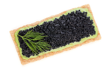 Canapes with black sturgeon caviar and  spice isolated on the white background.
