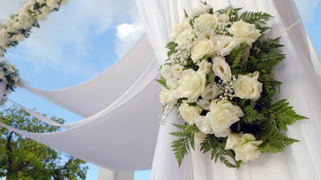 Beautiful static video 4k of the Jewish Hupa .Closeup on a bouquet from roses.