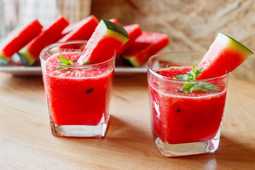 Watermelon drink on wooden background.