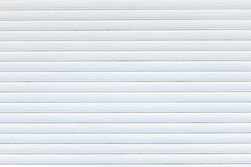Obraz premium White metal roller door shutter background and texture