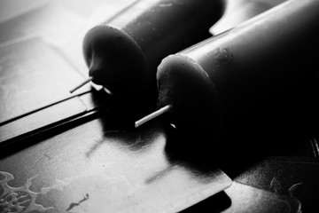 Candles and tarot cards.