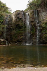 Fototapeta na wymiar waterfall near villa el salton, region santiago de cuba, Cuba