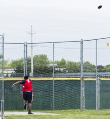 High school athlete throwing discus