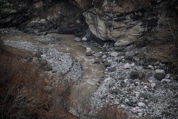 Panorama of the foggy winter landscape in the mountains with snow and rocks, Azerbaijan, Lahic, Big Caucasus