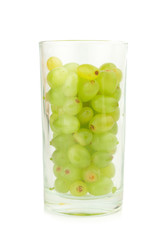 grapes green in glass water isolated on white background