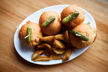 Home made burgers served with crispy fries