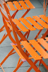 outdoor orange metal chairs