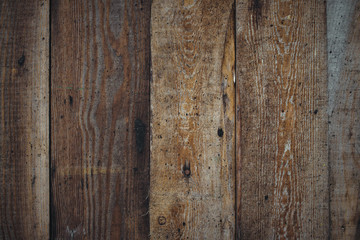 Vertical wooden planks forming a rough wood texture background