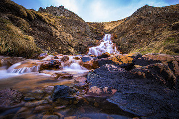 Hvitserkur - May 08, 2018: Waterfall at Hvitserkur, Iceland