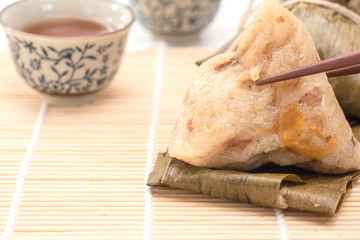 Zongzi - Traditional Dragon Boat Festival dumpling. Hand drawn watercolor painting isolated on white background.