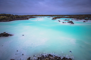 Blue Lagoon - May 09, 2018: Volcanic terrain at the Blue Lagoon thermal water spa, Iceland