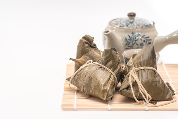 Zongzi - Traditional Dragon Boat Festival dumpling. Hand drawn watercolor painting isolated on white background.