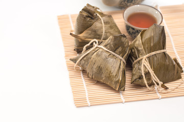 Zongzi - Traditional Dragon Boat Festival dumpling. Hand drawn watercolor painting isolated on white background.