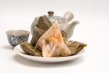 Zongzi - Traditional Dragon Boat Festival dumpling. Hand drawn watercolor painting isolated on white background.