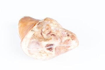A raw pork hock wrapped by plastic.