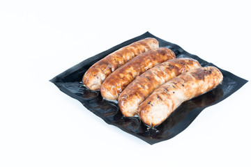 The grill sausages in plastic pack.