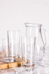 Glass jug and three glasses