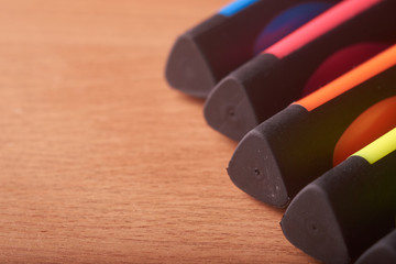 colored markers on the school table