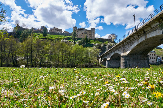 Historic town of Puebla de Sanabria from the Tera river shore