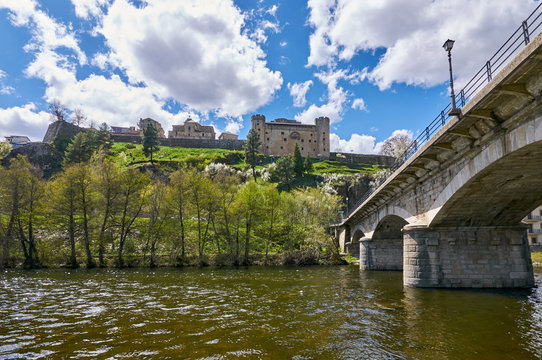 Historic town of Puebla de Sanabria from the Tera river shore