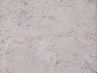 Fragment of stone texture with scratches and cracks. Natural Background.
