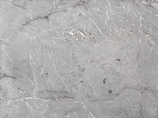 Obraz premium Fragment of stone texture with scratches and cracks. Natural Background.