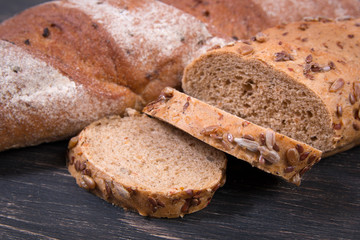 Fresh bread on wooden table