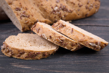Fresh bread on wooden table