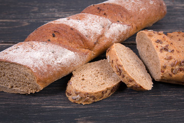 Fresh bread on wooden table