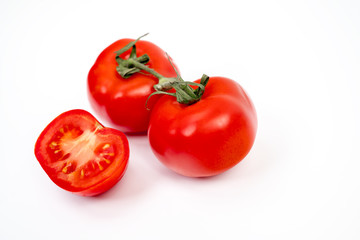 Red tomato isolated on white background with clipping path