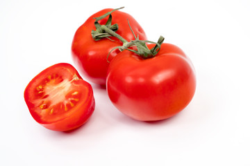 Red tomato isolated on white background with clipping path