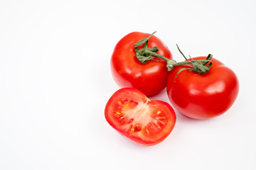 Red tomato isolated on white background with clipping path