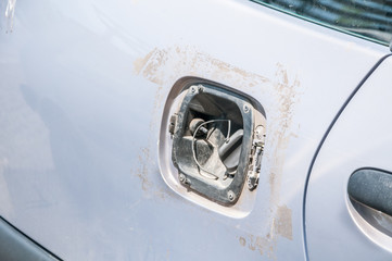 Stolen or broken and missing fuel tank cover for damaged car petrol or diesel fueling supply