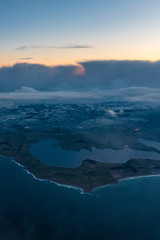 Norwegian coast seen from airplane after sunrise