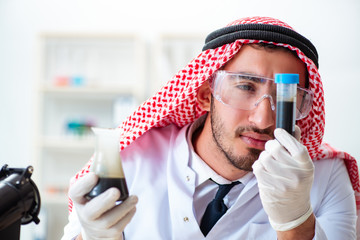 Arab chemist working in the lab office
